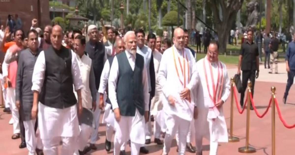 Led by PM Modi, parliamentarians walk to new Parliament building